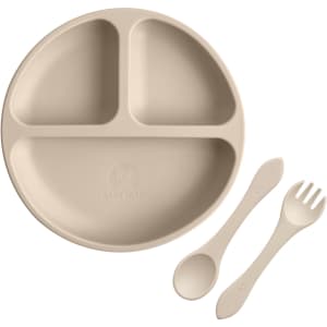 A beige silicone kids suction plate with three sections, accompanied by a spoon and fork, featuring a logo.