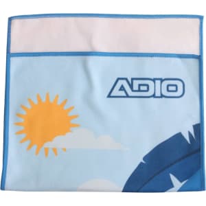A microfibre beach towel measuring 30x50cm, featuring a blue background with a sun and clouds design. It has a logo.