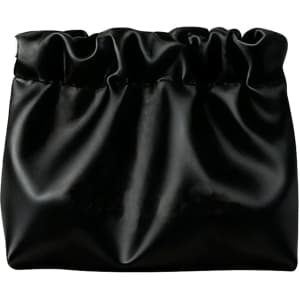 A black zipperless portable makeup bag with a gathered top, featuring a smooth, shiny surface. It has a logo on the front.