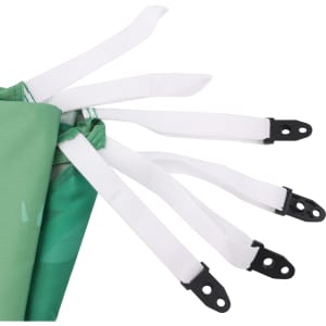 A green outdoor blanket with five white attachment straps at the edges, featuring black clips.