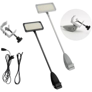 A collection of two adjustable LED lights in black and grey, along with mounting clips and cables.