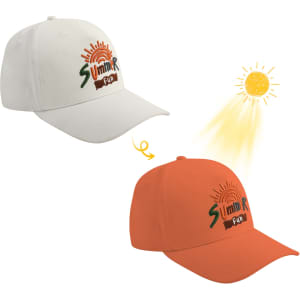 A colour changing baseball cap featuring a white design that transforms to orange in sunlight, with a logo.