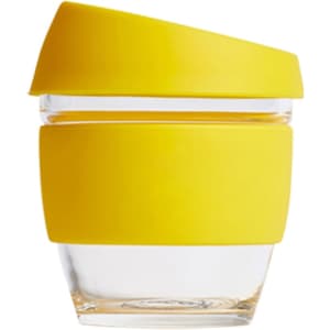 A glass coffee cup featuring a clear body with a bright yellow silicone lid and sleeve. It includes a logo.