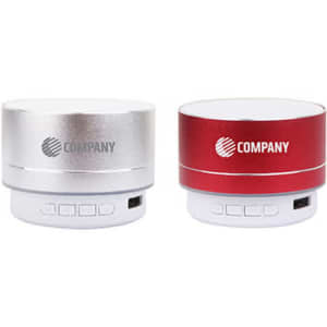 A silver and a red Metal Fashion Bluetooth speaker, both with branding, featuring control buttons on the base.