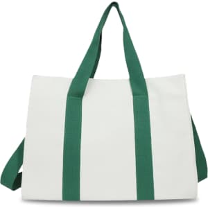 A canvas grocery shopping bag in white with green straps, featuring a logo on one side.
