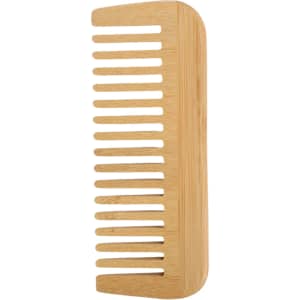 A bamboo comb with a light natural finish and wide teeth, featuring a smooth, rounded design.