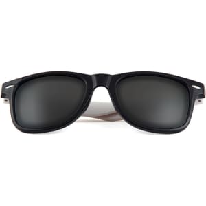 Stylish sunglasses in black with dark lenses, featuring a sleek design and a logo on the frame.