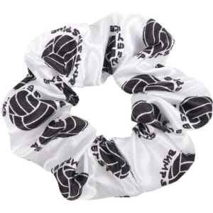 A white hair scrunchie with a black design and logo pattern throughout.