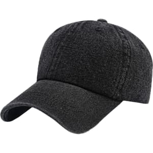 A dark denim baseball cap with a curved brim and embroidered details, featuring a logo on the side.