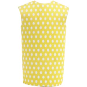 A drink bottle cooler in yellow with white polka dots, featuring a simple design and no visible branding.