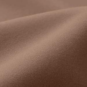 A close-up of smooth, elastic fabric in a warm brown colour, featuring fine weave texture.