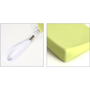 A silicone cosmetic pouch in light green with a white strap, showcasing its smooth surface and minimalist design.