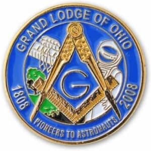 A blue and gold enamel pin featuring Masonic symbols, an astronaut, and representation of Ohio.