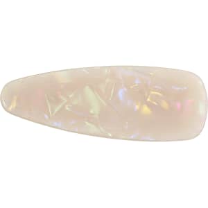 An acetate alligator clip in a pearlescent off-white hue with iridescent highlights and a smooth finish.