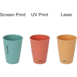 Three wheat straw toothbrush cups in teal, coral, and beige, featuring ribbed designs and logos.