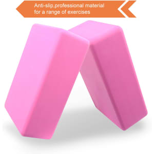 Two pink EVA yoga blocks with a smooth surface and angled edges, featuring a branding logo.