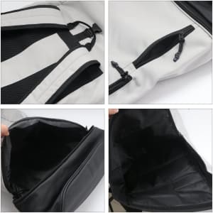 A roll top backpack in grey and black, featuring adjustable straps and interior pocket design. It has a logo.
