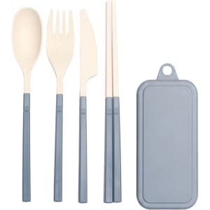 A travel utensil set with a spoon, fork, knife, and chopsticks, all in beige with blue handles, housed in a grey case.
