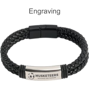 A double-row braided leather bracelet in black with a metallic engraving and a clasp closure.