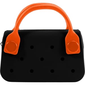 A mini handbag in black with orange handles and decorative holes on the front. It features a logo.