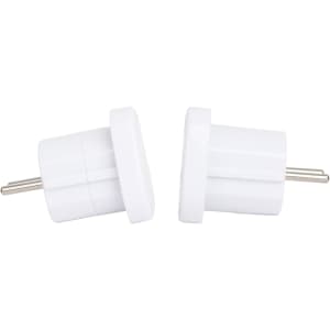 Two white travel adapters designed for converting AU plugs to EU sockets, featuring prongs for electrical connections.