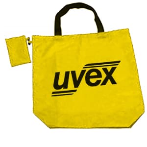 A foldaway shopping bag in bright yellow with black handles and a small attached pouch, featuring a logo.