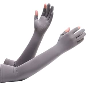 Long sleeve sun protective gloves in grey, featuring two open fingers and a streamlined design.