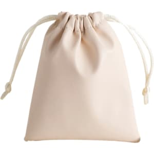 A beige PU leather drawstring gift bag with a cinched top and white drawstrings.