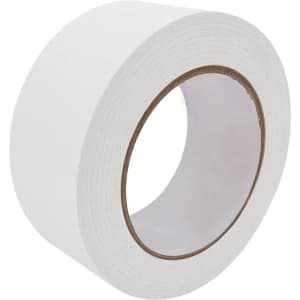 A roll of white self-adhesive Kraft paper tape on a cardboard core, featuring a smooth, flat surface.