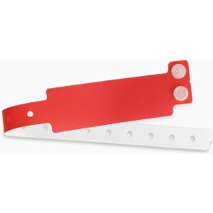 A red and white disposable PVC wristband with perforations and a logo. Ideal for events and exhibitions.