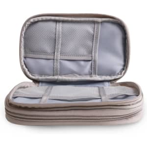 A beige electronic accessory organiser bag with a zip, featuring mesh pockets inside for storage.