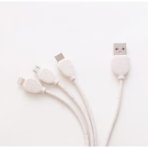 A square-shaped charging cable in white, featuring multiple connectors at one end and a logo on the connectors.