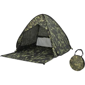 A pop-up beach tent in camouflage pattern, featuring an open entrance and a compact carrying bag.