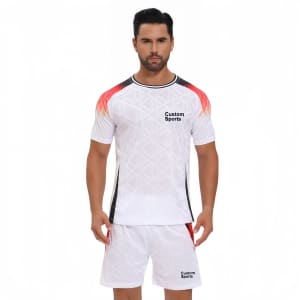 A set of 100% polyester sublimated breathable soccer shorts in white with red and black accents, featuring a logo.