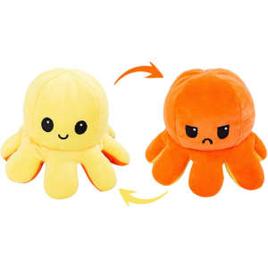 A reversible plush octopus toy features a happy yellow side and an angry orange side, showcasing vibrant colours.