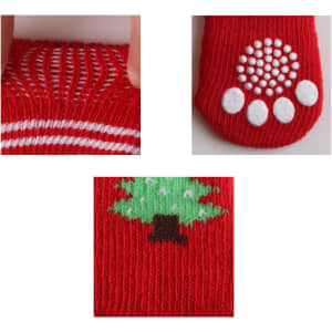 Red pet socks featuring white and green holiday-themed designs, including a tree and dotted grip pattern.
