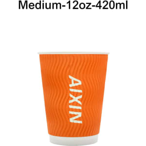 An orange corrugated double wall paper cup with a ribbed texture, featuring a logo on the front.