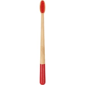 A large conical handle toothbrush with a red and natural bamboo design, featuring a colourful bristle head.