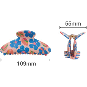 A large hair clip featuring a pink background with blue and red floral patterns, measuring 109mm by 55mm.