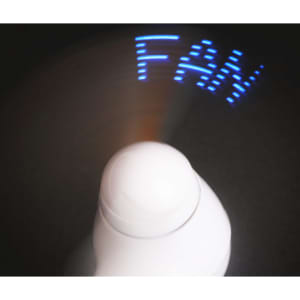 A white handheld fan displays blue LED text while in motion. Features a logo on the body.