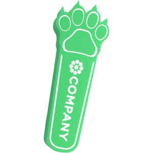 A green paw-shaped drink stirrer with a logo on it.