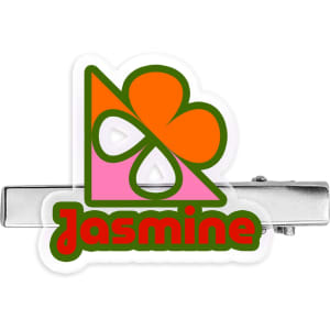 A multicoloured acrylic hair clip featuring a vibrant design with orange, pink, and green elements, and a metallic clip.