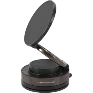 A black suction magnetic phone holder with a rotating top, featuring a base with a textured design and a logo.