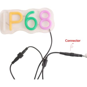 A neon LED sign in yellow, green, and purple with an IP68 designation and connected wiring.