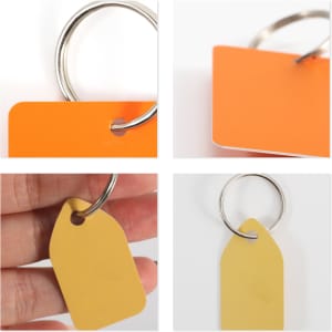 Custom shape plastic key tags in vibrant orange and yellow, attached to a metal ring for easy carrying.