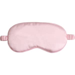 A satin sleep mask in soft pink, featuring an elastic strap for a secure fit. It has a smooth, soft surface.