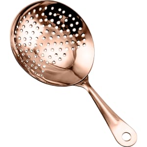 A cocktail strainer in a shiny rose gold colour with a long handle and multiple perforations. It features a logo.