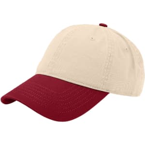 A solid beige and burgundy fashion cap featuring a curved brim and a logo on the front.