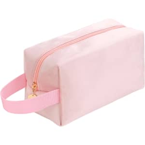 A pink flannel cosmetic bag with a zip closure and a strap on one side, featuring a branding logo.
