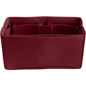 A maroon felt bag organiser with multiple compartments for storage. Features a simple, structured design and includes a logo.